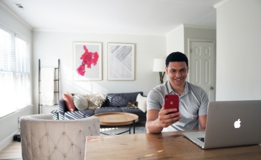 happy man with laptop 